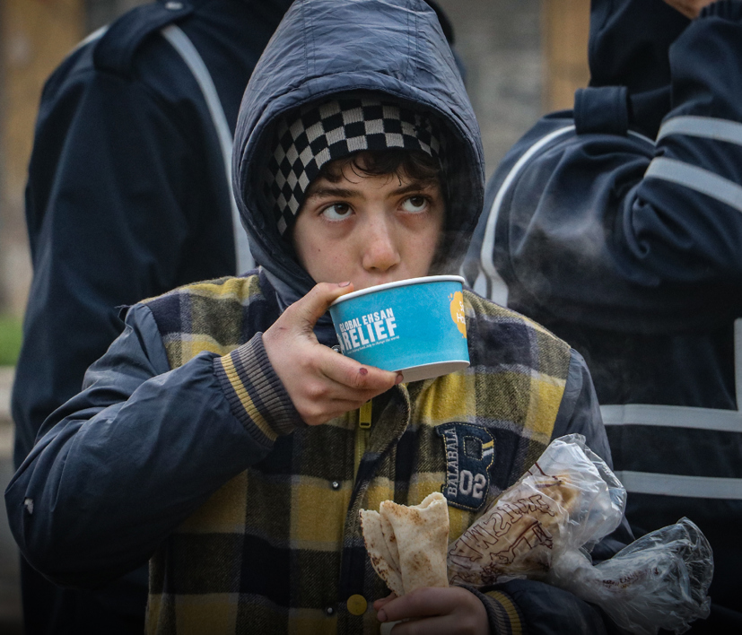 Boy Easting Bread